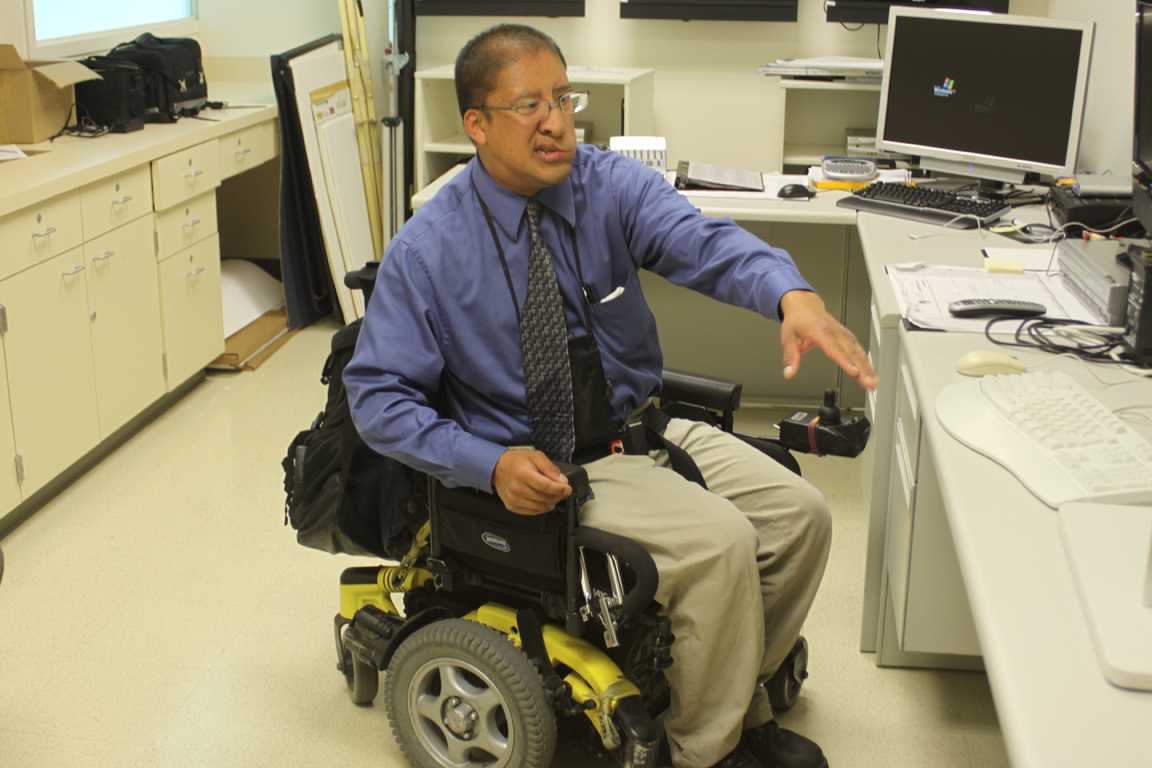 SUCCESSFUL STUDENT WORKER: Jorge Acevedo combines his love of law enforcement with advocacy for disabled access.