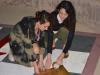 Maral Janoyan and Sarina Tounian work on the final touches for their sculpture project.