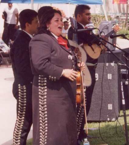 Monica Loya and fellow mariachi band members perform their rendition of Mexican songs.