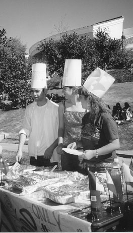 Photo by Jacqueline Demirjian

GCCs international student club, which was one of many clubs present, serves Thai food to promote diversity on campus during Oktoberfest 2003. 