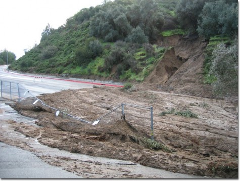 Recent heavy rains in Glendale caused this hillside next to Glendale College to give way and send torrents of mud cascading down Mountain Street Monday afternoon.