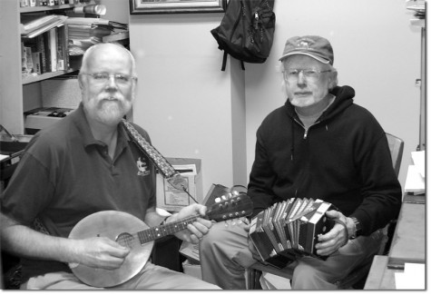 Dennis Doyle, on mandolin, and Desmond Kilkeary, on concertina, enjoy a traditional Celtic jam session.