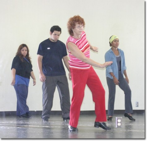 Patti Cox leads students in tap class. She has been teaching dance at the college since 1981.