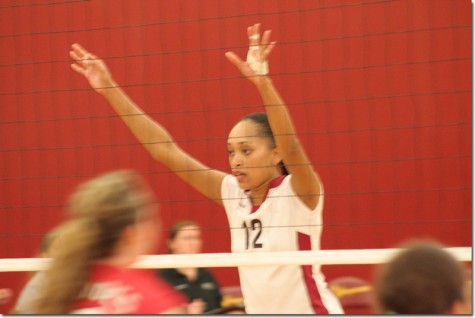 Middle blocker Susie Marco guards the net at Fridays game against Bakersfield.