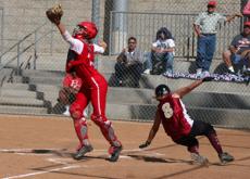 Lady Vaquero catcher Kristina Nazarian, 8, scores the winning run, against Bakersfield on April 17.