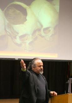 Father Vazken Movsesian talks about the Armenian genocide and compares it to the Rwanda genocide during the lecture in Kreider Hall on April 22.