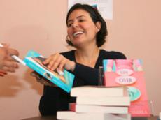 Glendale alumna turned author Maria del Toro signs books after her lecture at Kreider Hall.
