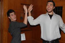 Joseph Gjura, left, and Frank Pozos high-five after being picked to play in fall theater productions.