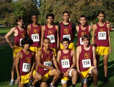 The mens cross country team gathers after their WSC victory.