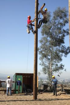 CLIMBING TO NEW HEIGHTS: Verdugo Power Academy students are taking scholastics to a new height. Marco Jimenez, a 7-year veteran of Burbank Water and Power, is providing invaluable on-the-job training to these Glendale Community College students. Power Aca