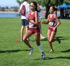 Lady Vaqueros Angela Martinez, left, and Brianna Jauregui pace each other mid-way through the event.