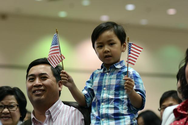 Thousands of Immigrants Take the Final Step to Citizenship with SLIDESHOW COVERAGE
