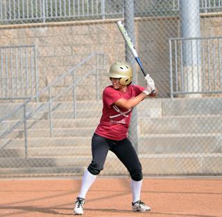 A SWING AND A HIT: Team captain and offensive player of the year Rebecca Hernandez is up at bat for the Lady  Vaqueros. 