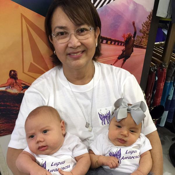 Raquel Mathay and her newly born grandchildren, Sailor and Marina, supporting Lupus Awareness Month.
