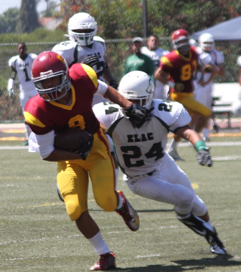 ONE AND ONLY: Travis Custis (No. 8) breaks away from East LA College defender in a game last year. East LA College is the only team the Vaqueros have beaten this season.