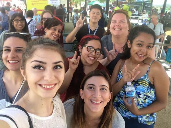 BUT FIRST: ASL 101 students sign “I love you” as they pose for a seflie at the DEAFestival on Saturday.