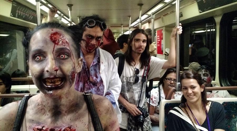 Corey Zicari and Ricardo Orta ride the Red Line train to Hollywood and Highland for the Hollywood Subway Zombie Walk on Sunday.