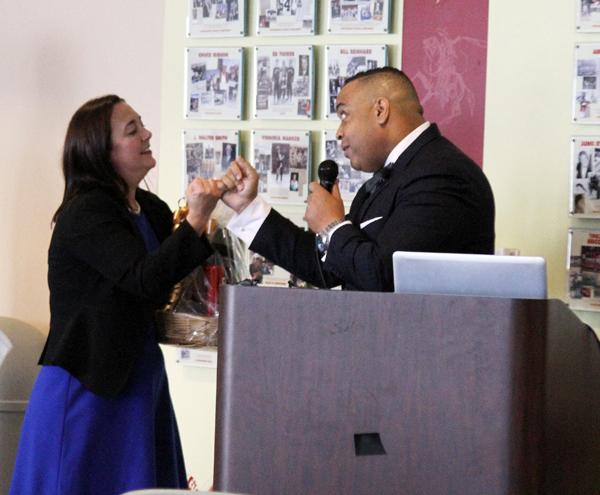 PINKY PROMISE: After sharing her story behind the Freedom Writers Foundation, keynote speaker, Erin Gruwell, locks pinkies with Robert Hill, dean of student services, and promises to be part of the Glendale College family forever. Gruwell calls the pinky promise  a “binding contract.”