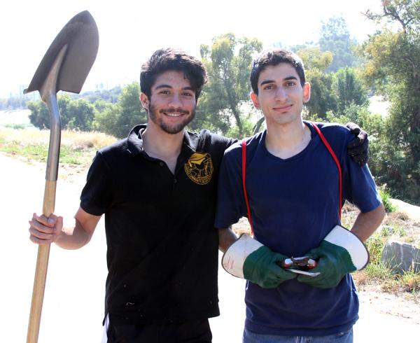 Diggin It: Scholars club members Issa Al Hadeed and Patrick Haroutunian volunter to restore L.A. River plant life at the Glendale Narrows Riverwalk on Saturday