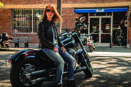 HARLEY AND ME: Author Bernadette Murphy poses on her Harley Davidson motorcycle. She learned to ride at age 48 and found the experience empowering.
