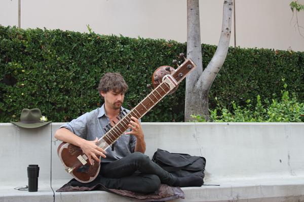 SOUNDS OF INDIA: Evan Hatfield performs on the sitar.