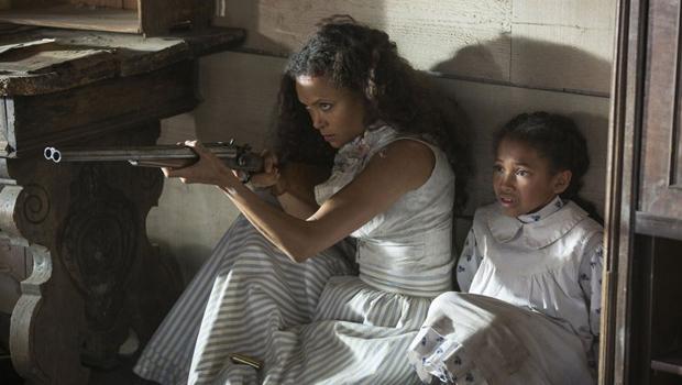 GO WEST: Brothel keeper Maeve Milay (Thandie Newton) has a tragic history as settler who unsuccessfully defended her daughter (played by Jasmyn Rae) from a violent Indian attack. Westworld questions whether a synthesized memory can be experientially real.
