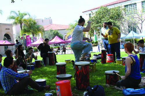 DANCING TO THE RHYTHM: Alan Bruni (middle) dances to the beats from students during lunch.