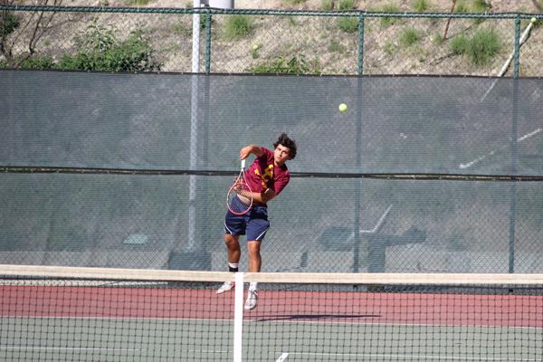 GAME, SET, MATCH: Vaquero Chris Hess, above, serves during the pick-up match against New Mexico March 15. Glendale’s David Preciado, right, returns a serve against Victor Valley on March 14.