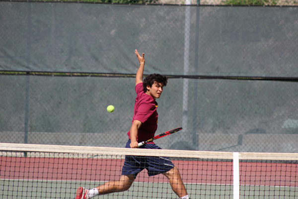 SINGLES STAR: Christian Hess in a pickup game against the New Mexico Military academy at GCC on March 15.