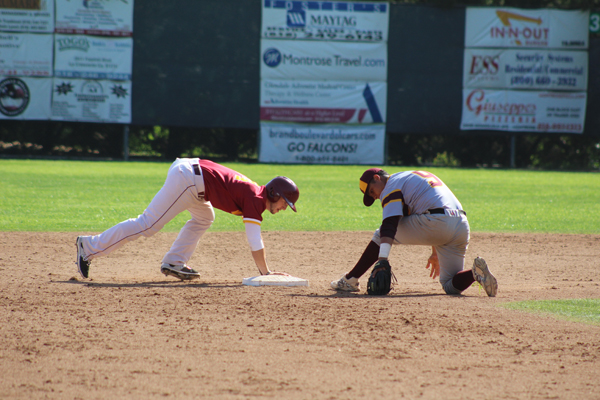 HE’S SAFE! Vaquero Zach Mausserslides safely into second base after a steal in the bottom of the 6th inning against  Victor Valley at Stengel Field on March 30. 