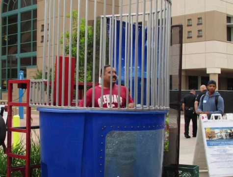 Isaac Pedraza getting dunked at the transfer celebration ceremony May 10 at Plaza Vaquero.