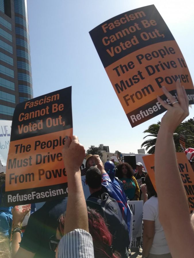 YOUNG AND OLD: Some protesters from the group Refuse Fascism took part in a rally on Sunday, Oct. 13, with people of all ages being present in front of the Federal Building on Wilshire Blvd.