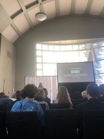 Journalist and freelancer Lika Zakaryan shows trailer of her documentary "Invisible Republic" covering the 44-day war in Karabakh. (Alexandra Der Boghosian, Staff Photographer)